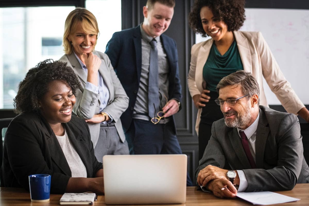 Business professionals collaborating around a table